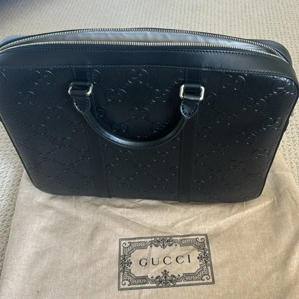 New-Gucci leather bag. Can be used for work or travel. fit laptop & work files.